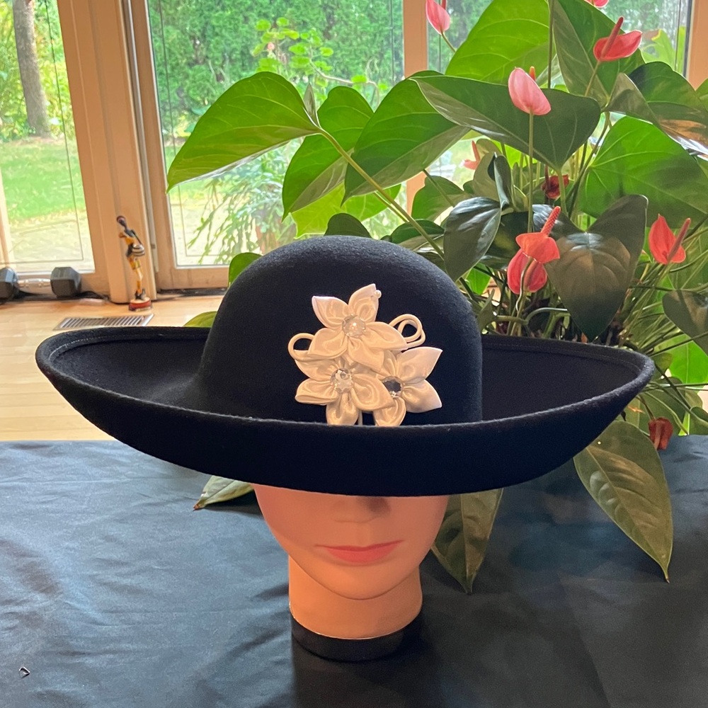 Elegant Black Wool Hat with White Floral Accent